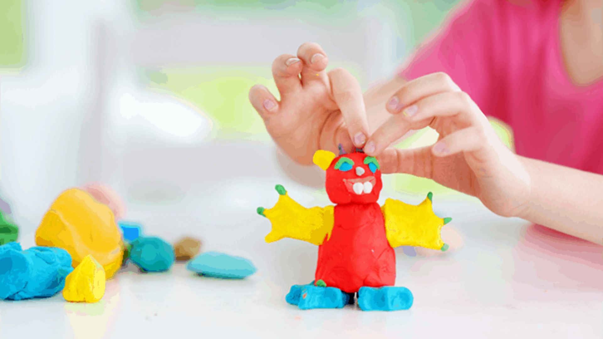 Playdough modeling anger management activity for kids to express anger by creating and reshaping a red monster figure