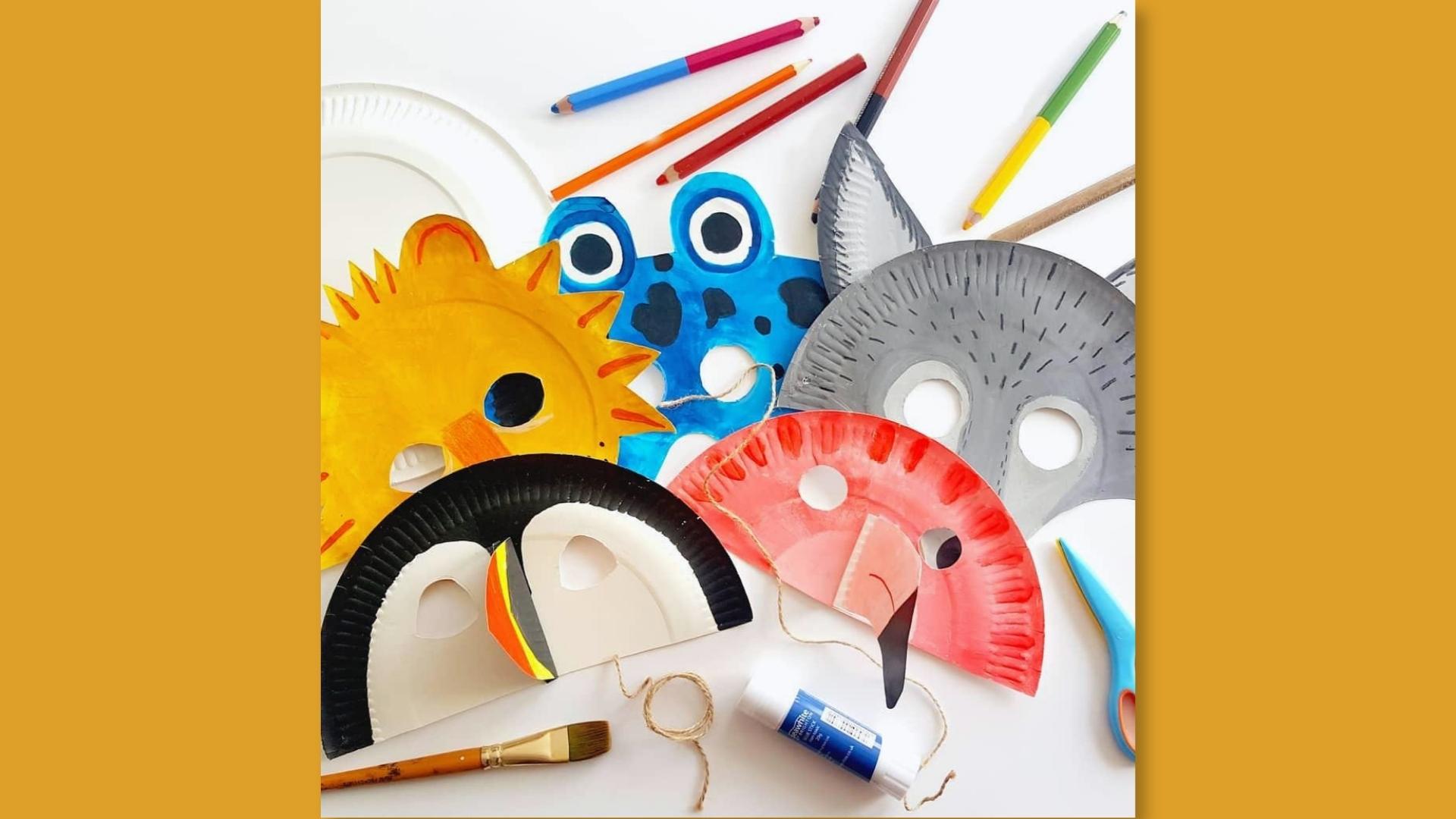 Five colorful paper plate animal masks, colored pencils, scissors, glue, paintbrush, craft supplies.