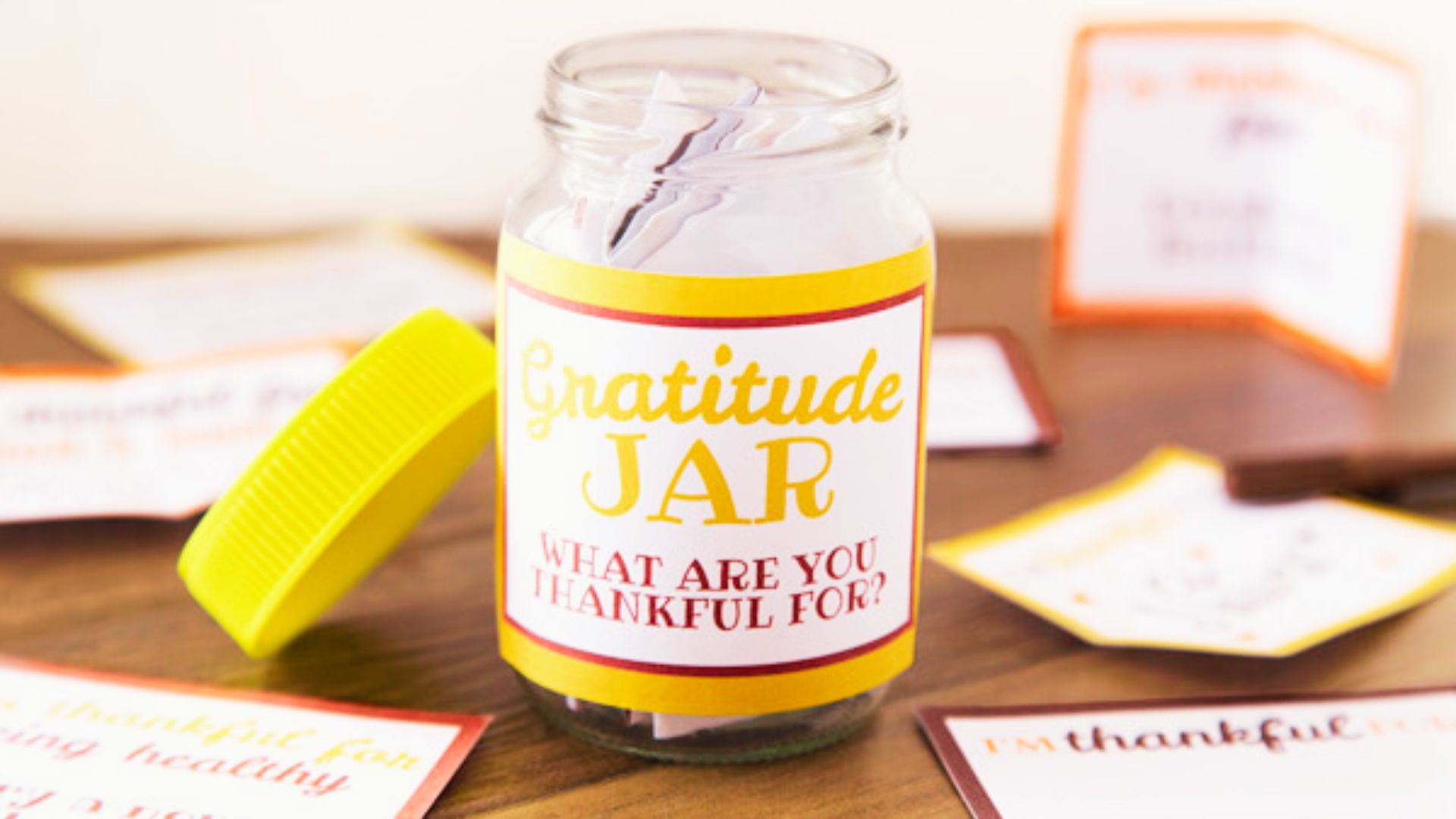 Printable gratitude jar template with colorful design, featuring space for writing notes of appreciation and thankfulness.