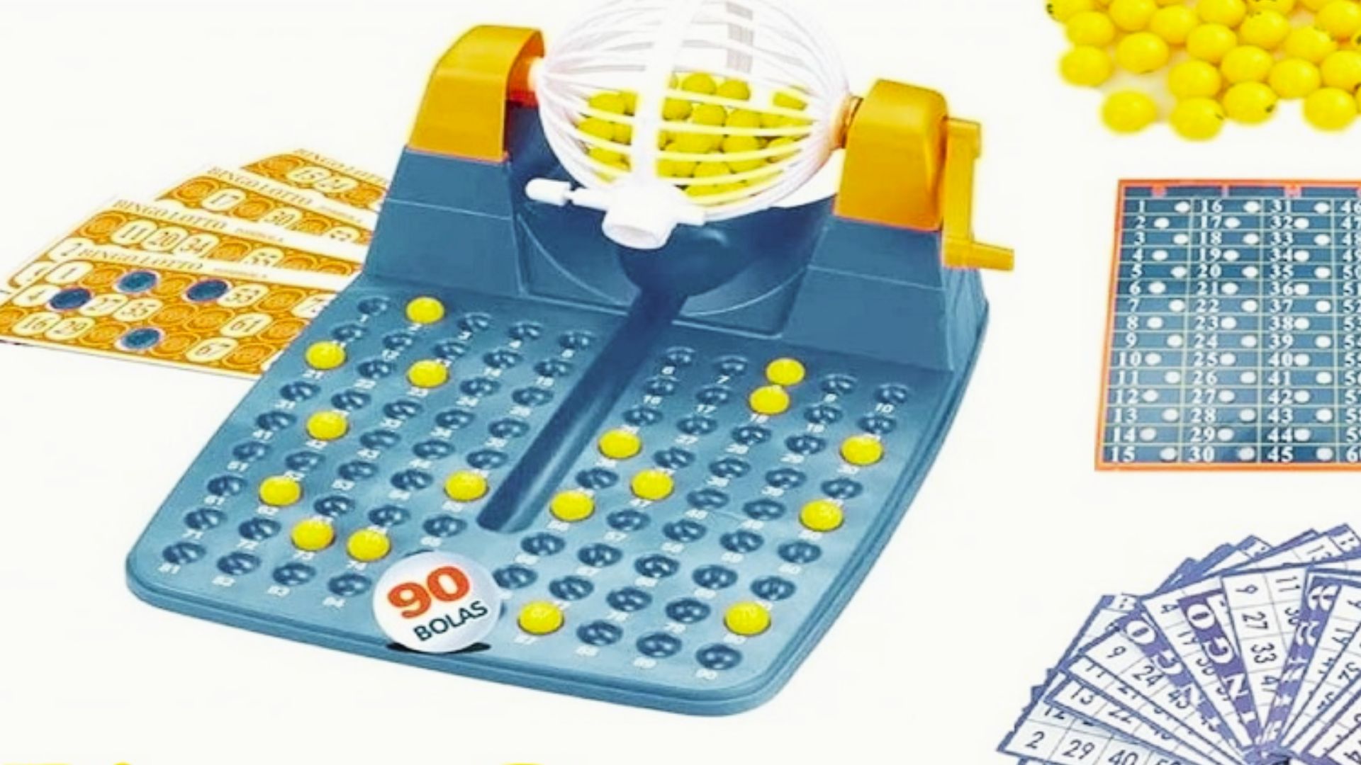 A bingo game setup featuring a numbered ball and a player’s bingo card on a table.